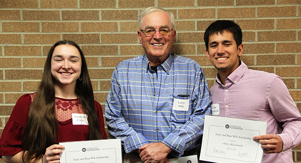  Scholarship recipients stand with Foundation donor