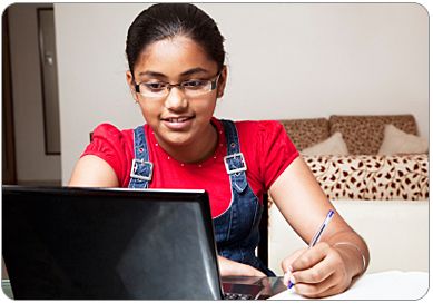 Young teen on laptop 