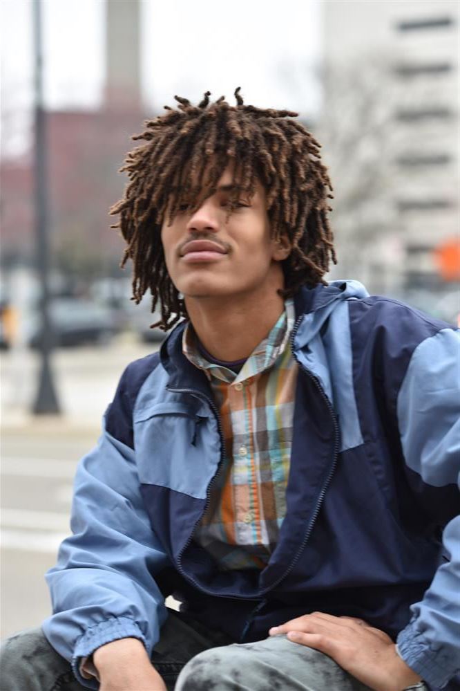 Elijah Simon poses for his senior graduation photos.