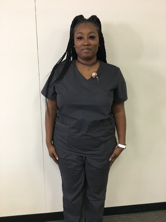 Mondrea Sims poses for a photo in her CNA uniform. Mondrea Sims poses for a photo in her CNA uniform.