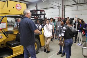 Students learn under the guidance of a community partner 