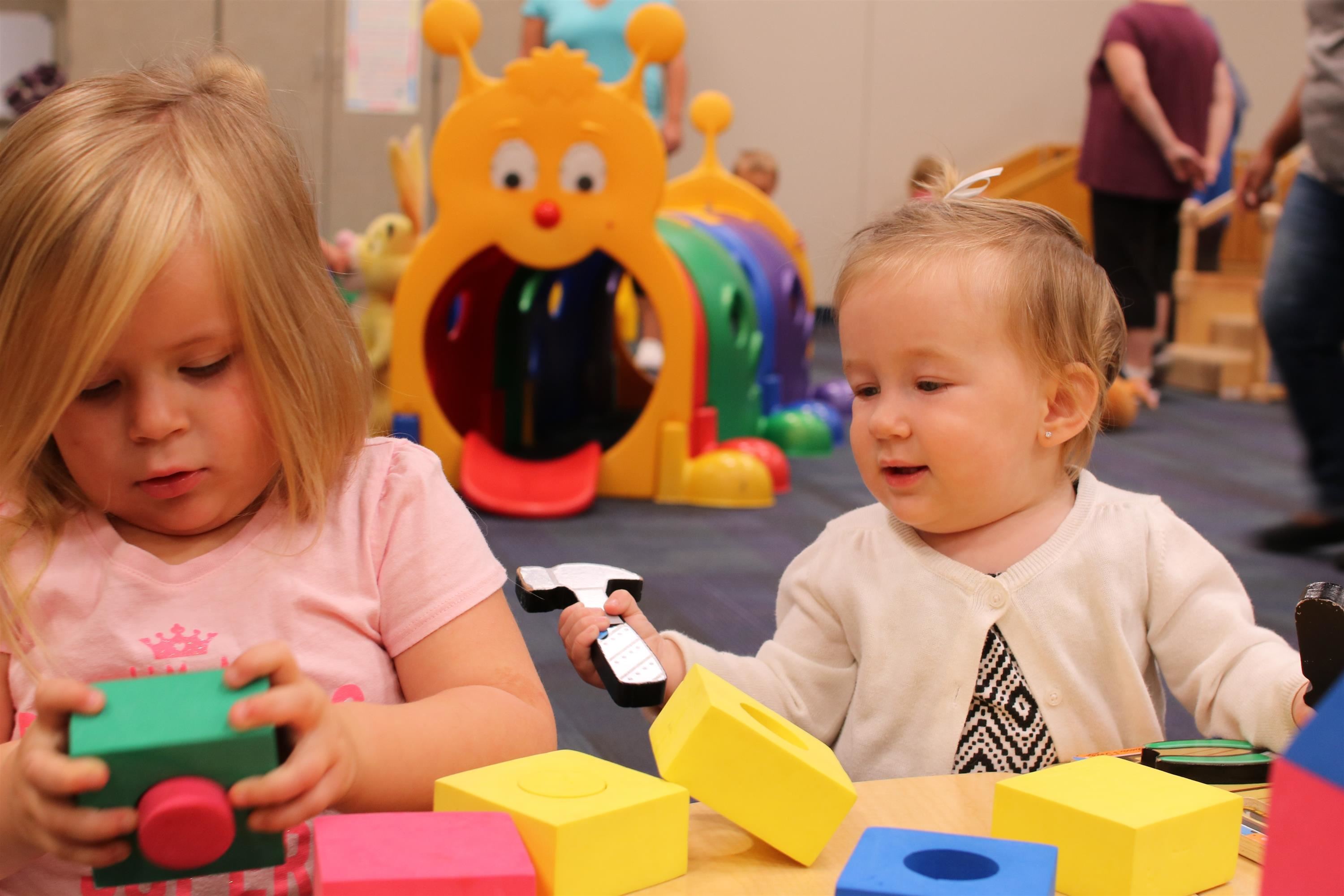 kids platying in community playgroups kids platying in community playgroups
